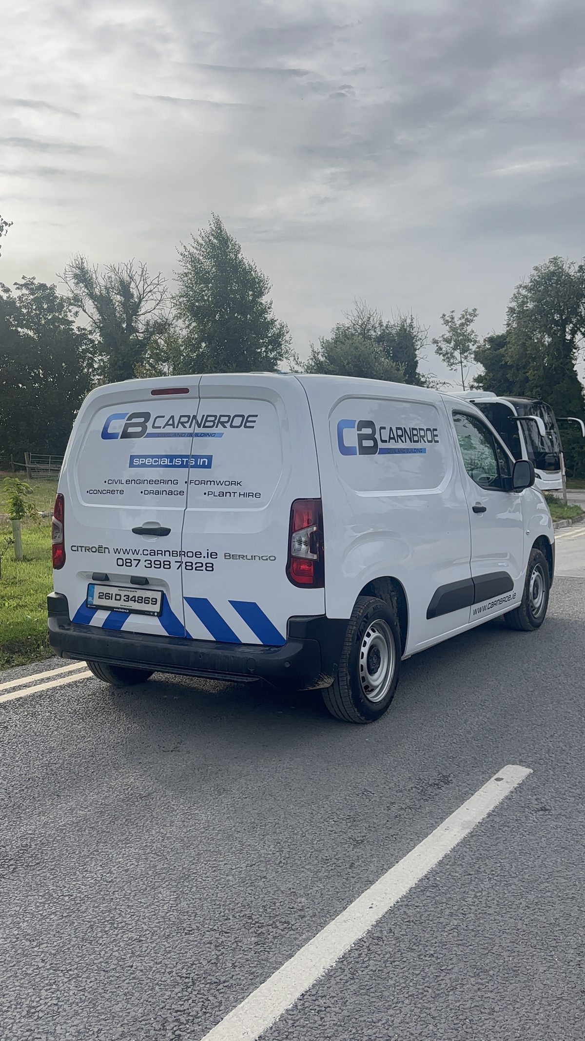 White Citroën Berlingo van with blue Carnbroe Civil and Building graphics, fitted by Ardee Coach Trim